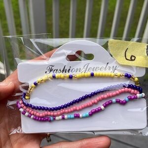 Set of 4 Stretchy anklets.  NWT.. handmade.